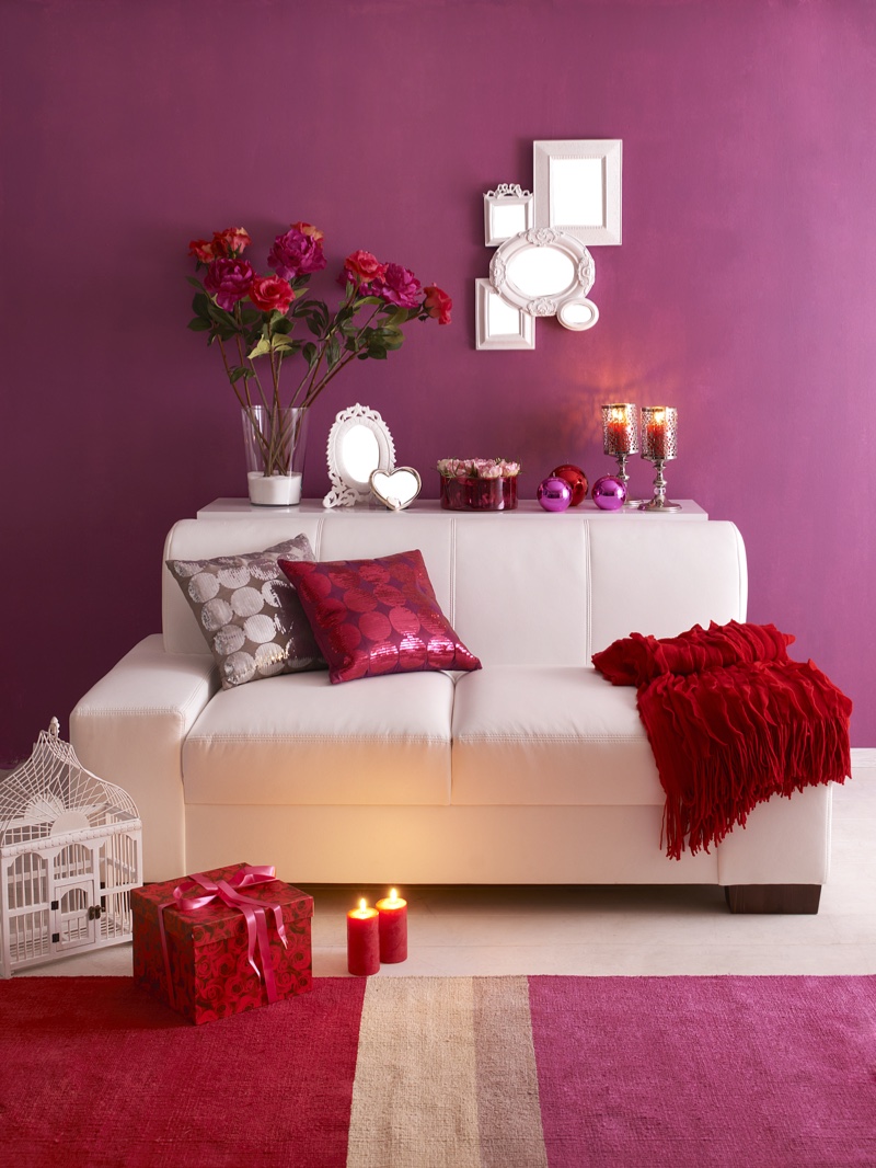 Shades of purple and red bring warm jewel tones to a room. Let the eye rest with a neutral color like white.